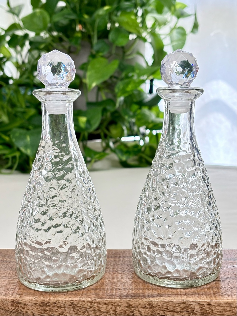 Set of 2 Clear Hammered Glass Decorative Bottles with Crystal Like Stoppers 6.5”